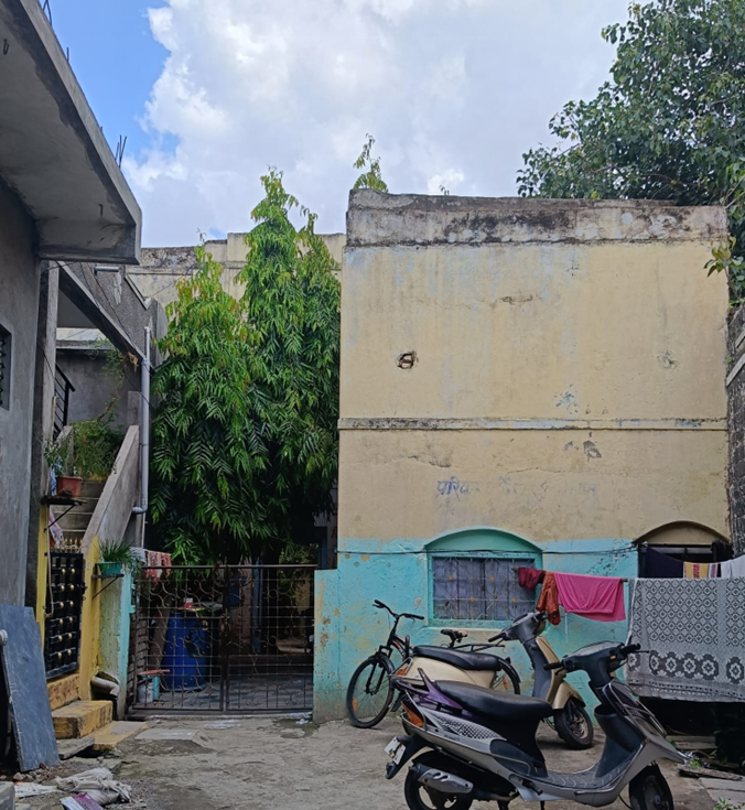 Front view of the house. It features a small metal entrance gate. (Source: CKA Archives)