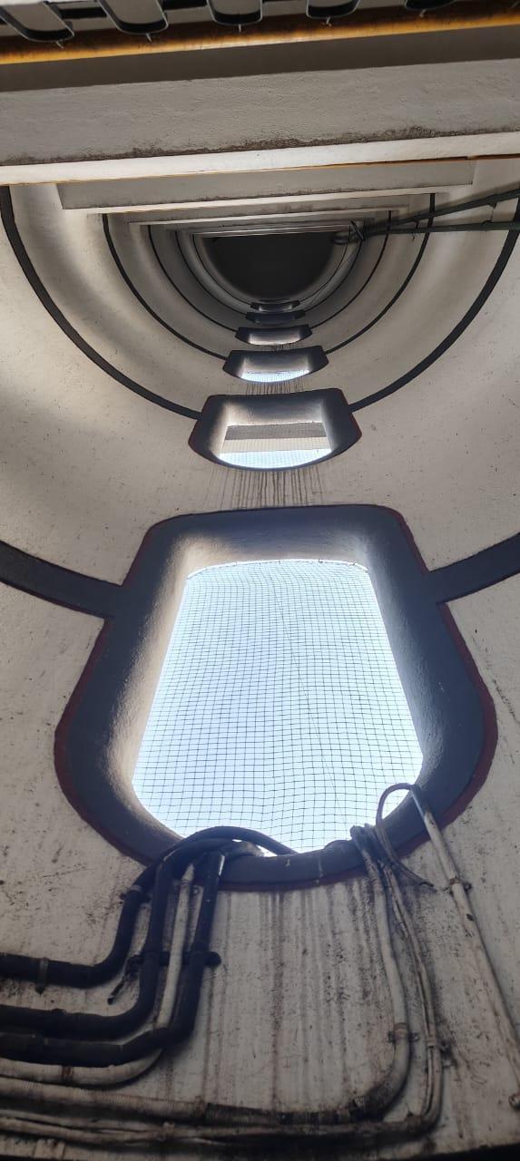 Capsule-shaped window embedded in the lift core.Possibly the most recognisable feature of the building, this window introduces a curved geometry that is carried forward in other elements. (Source: CKA Archives)