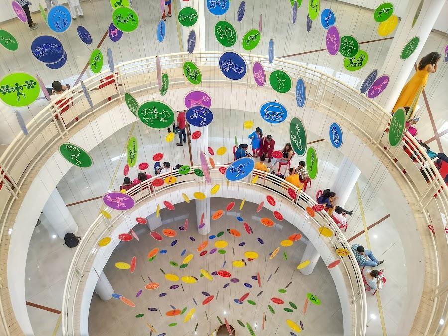 A view of Thane Kala Bhavan’s distinctive architecture—round on the inside and cone-shaped on the outside—showcasing its exhibition spaces, conference hall, reading library, and workshop facilities.[4]