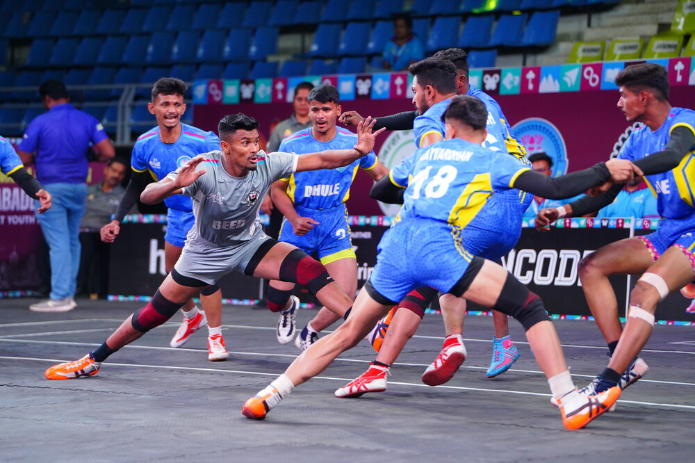 Shankar Maighane (in grey)[1]