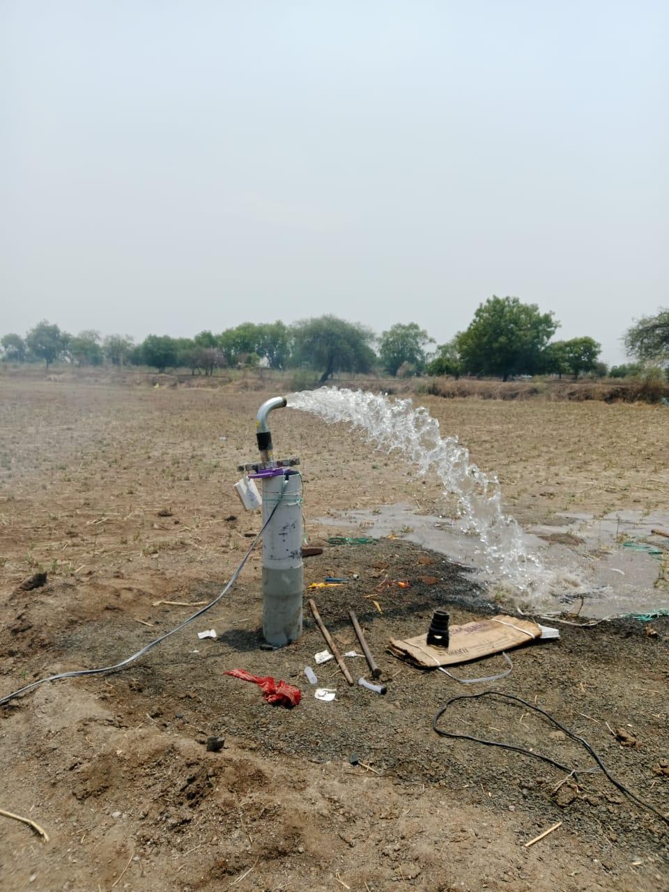 An irrigation system is in process on a farm. (Source: CKA Archives)