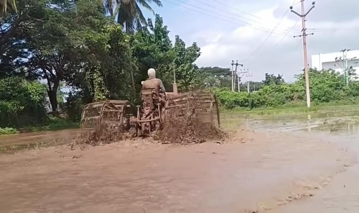 A machine is being used to prepare the land for Paddy Cultivation. (Source: CKA Archives).