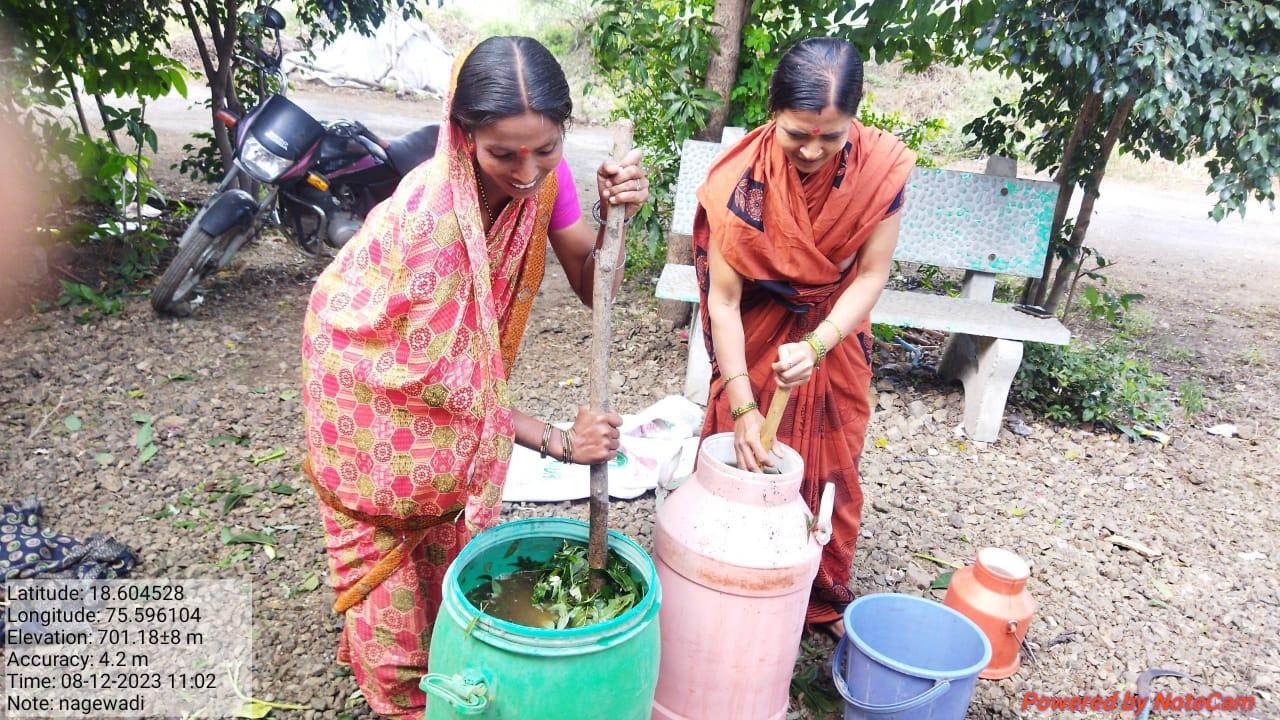 Women stir a tub full of Dasparni extract ingredients. (Source: CKA Archives)
