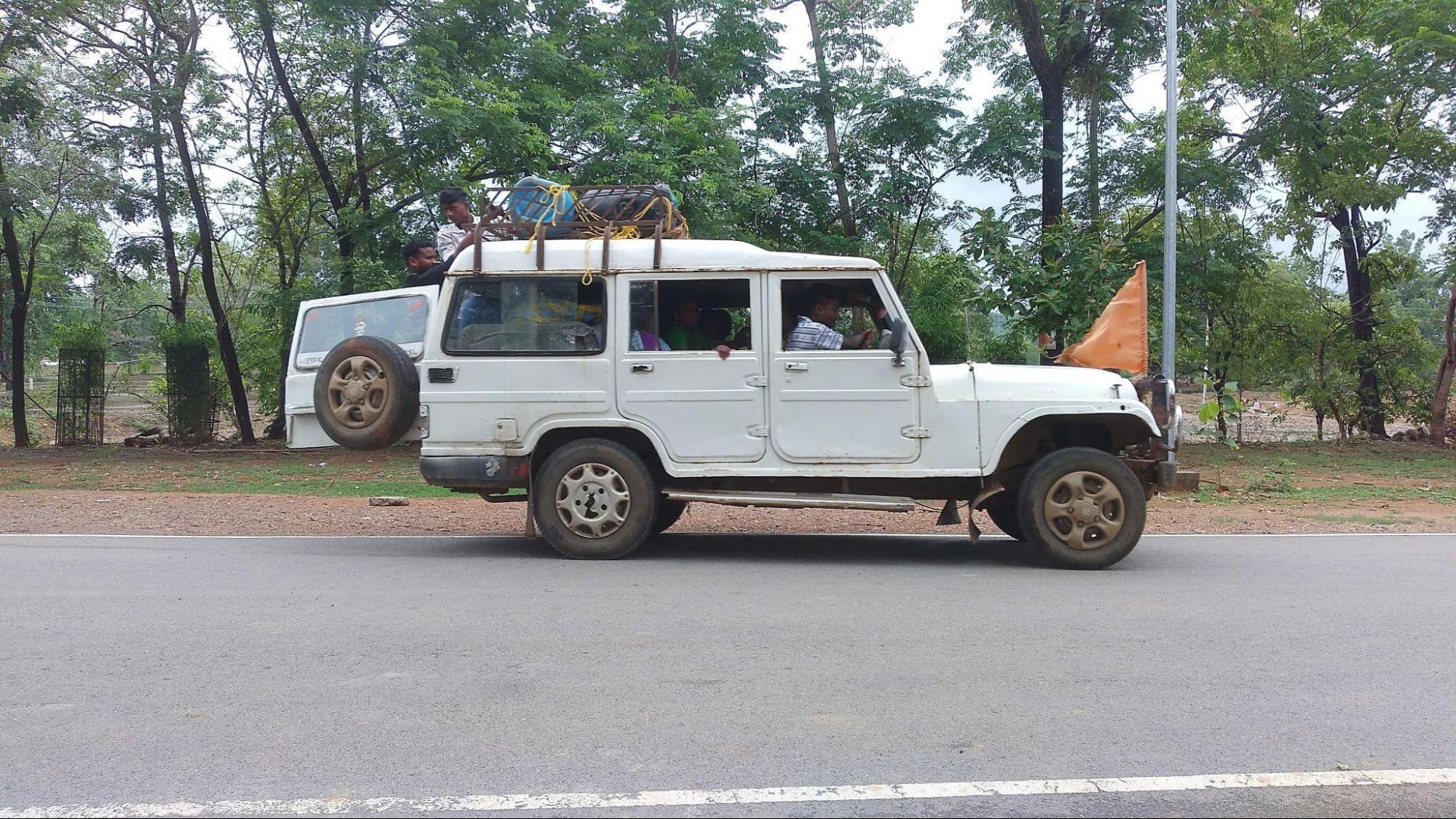 A jeep-type vehicle functioning as a shared taxi for local commuters.(Source: CKA Archives)