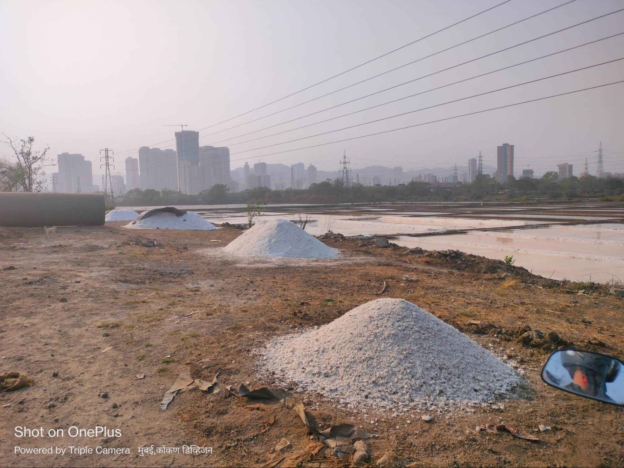 Salt pan lands lie parallel to the ever-growing urban landscape. (Source: CKA Archives)