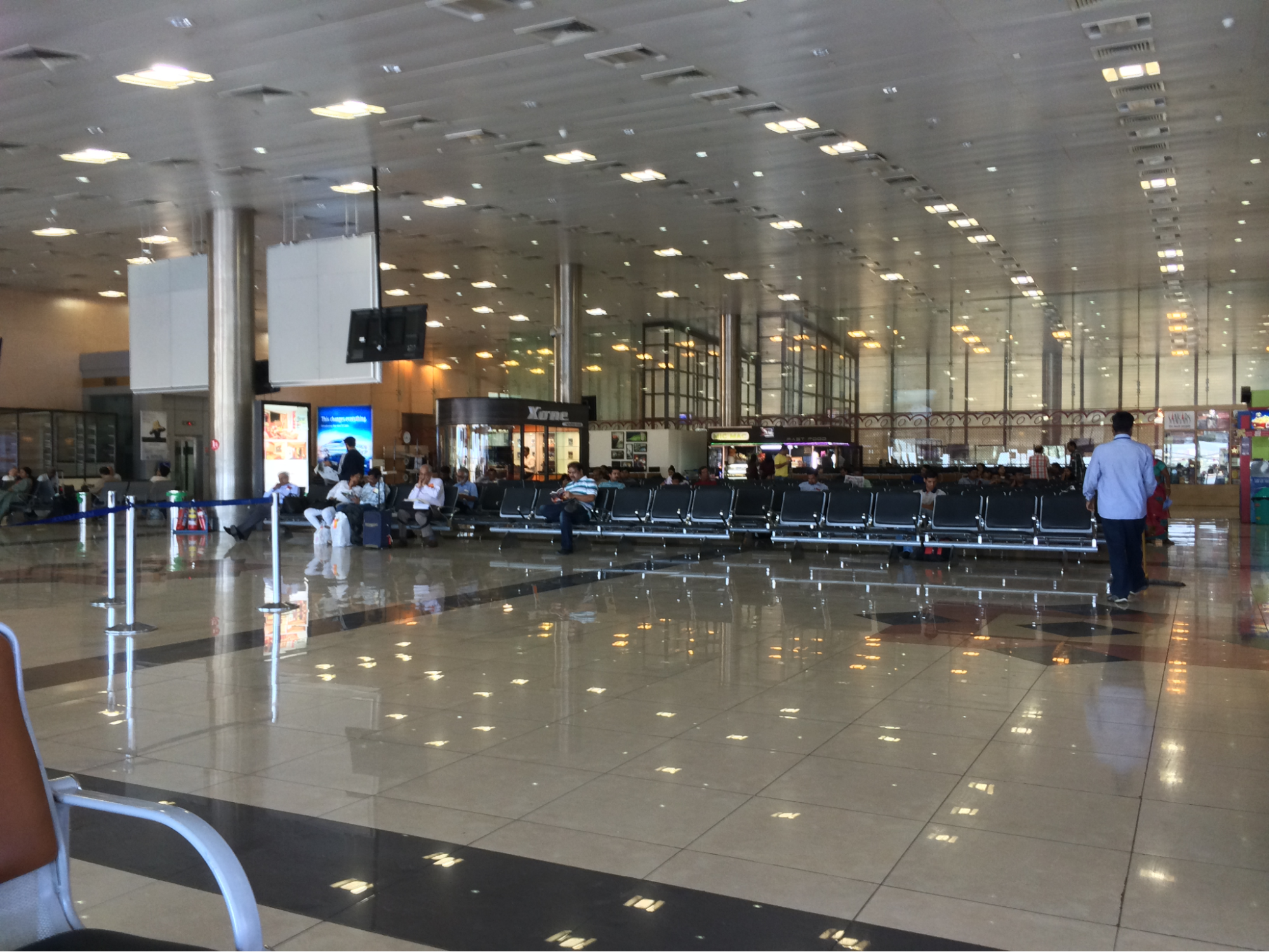 Interior view of Pune International Airport terminal.